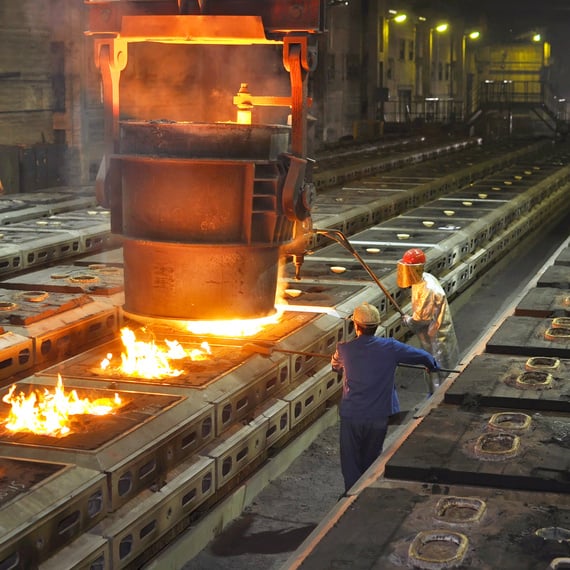 Production of metal components in a foundry - group of workers